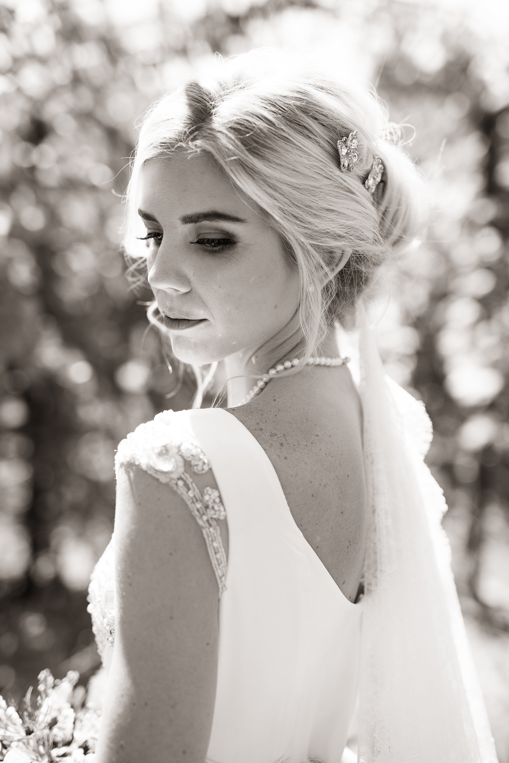 Back view of Georgias bodice with scoop back and rhinestone-detailed cap sleeves
