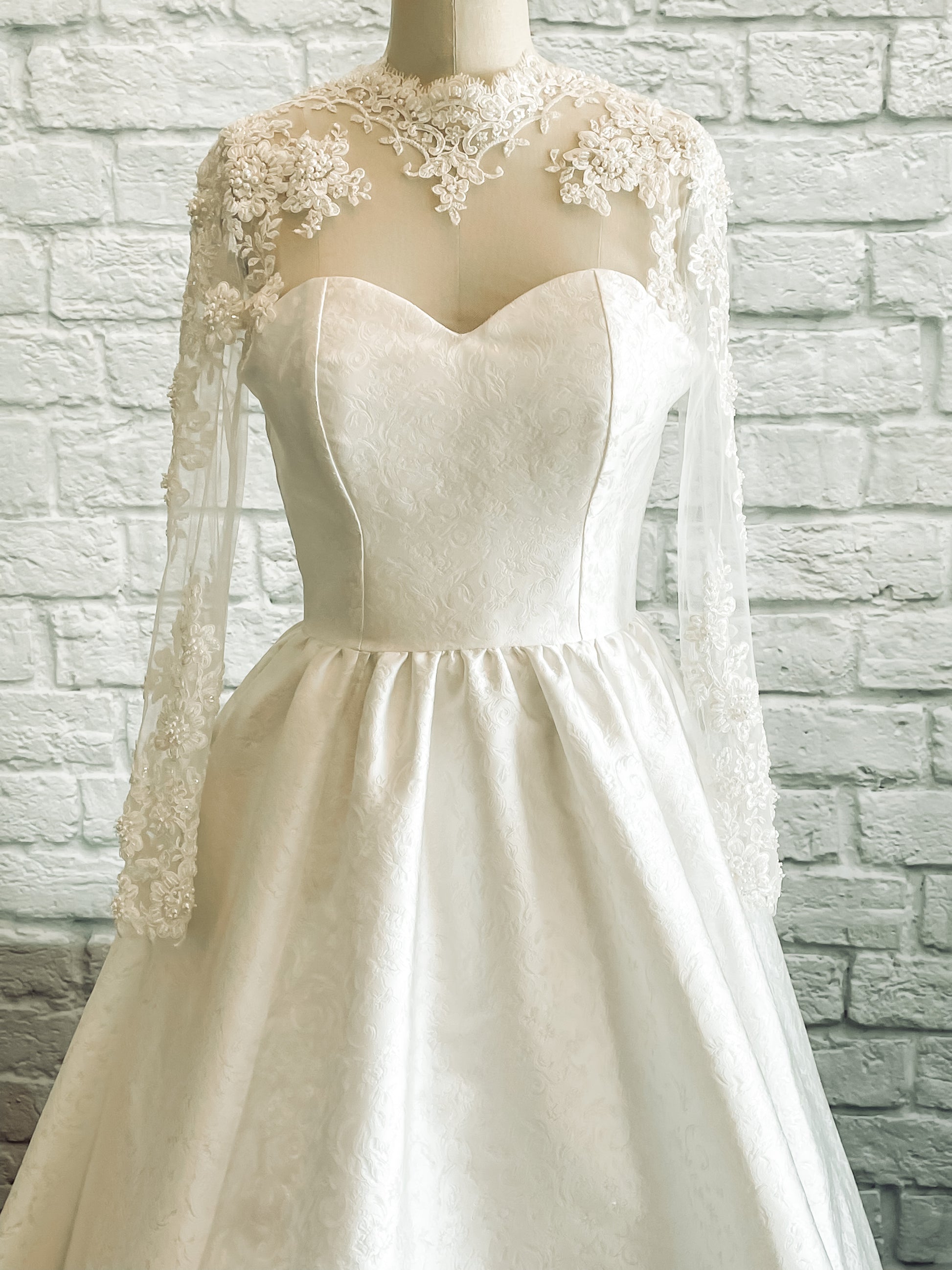Beaded lace detail on illusion neckline and shoulders of Gemma bodice