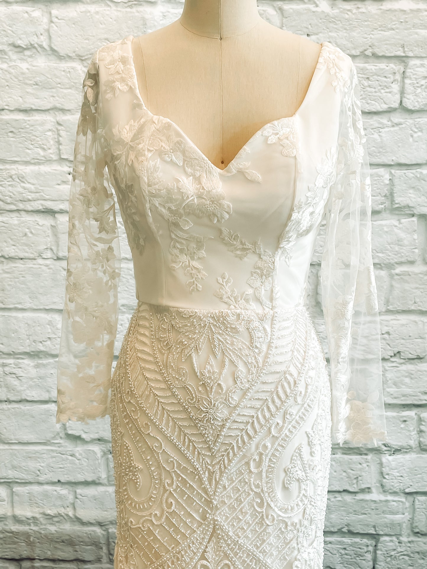 Close-up of Octavia bodice with flat lace sweetheart neckline and princess seams