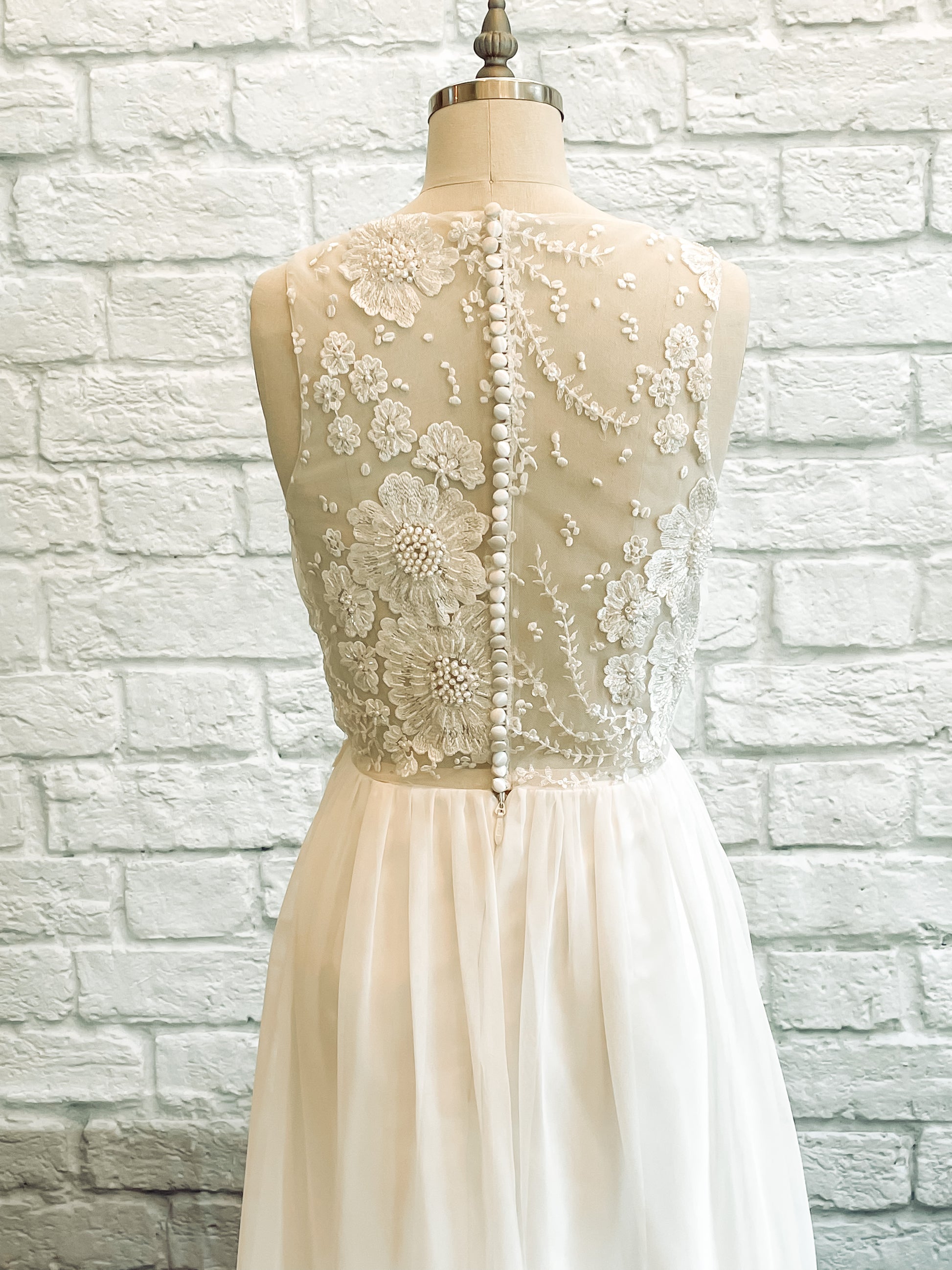 Romantic lace detailing along back bodice of Odette wedding dress