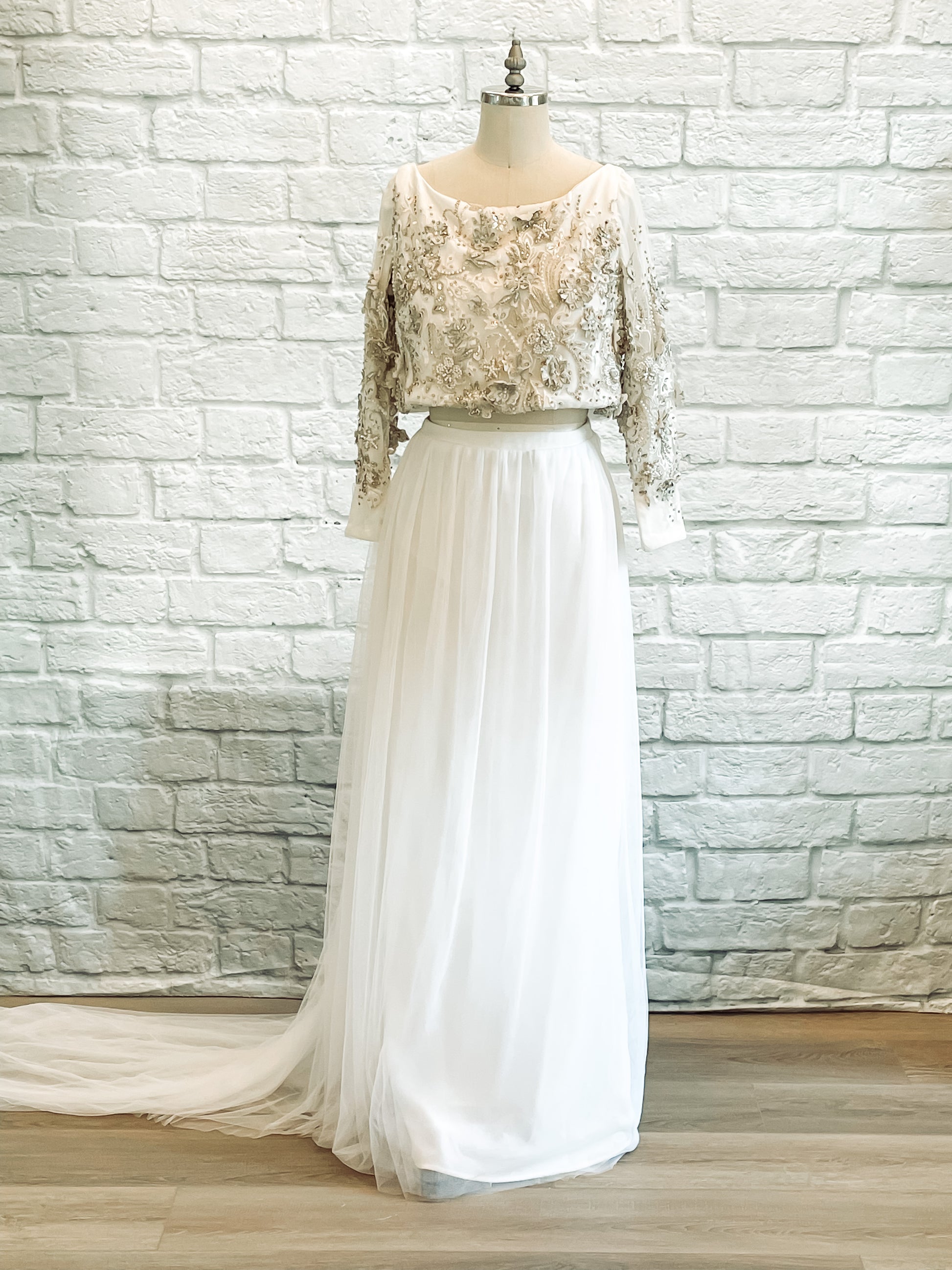 Full front view of Ember on a mannequin, showing off the 3D floral lace bodice and soft layered tulle skirt