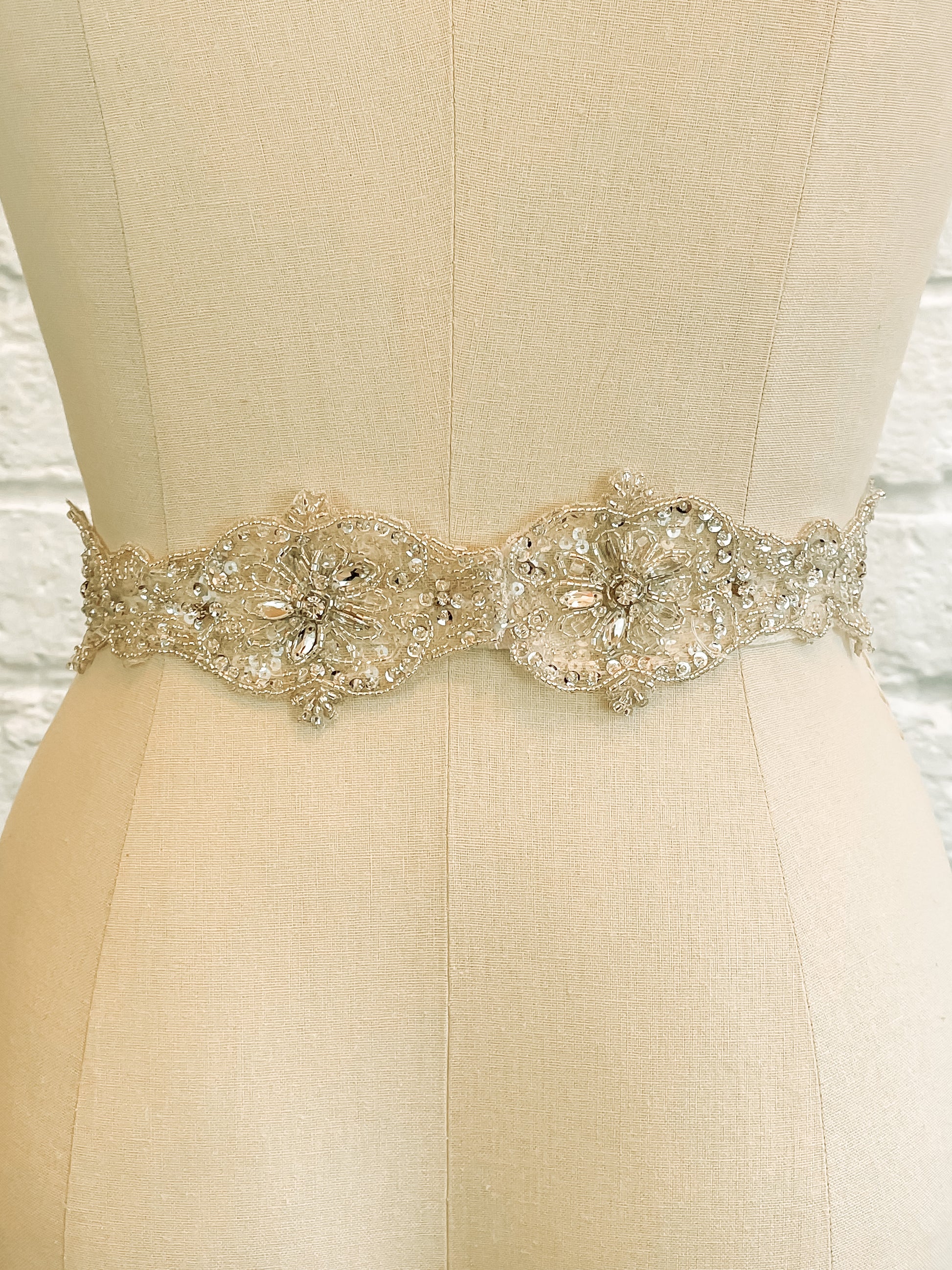 back veiw of Beaded bridal sash in champagne and silver tones with rhinestone details