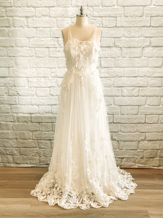 Jacqueline wedding gown with illusion straps, sweetheart neckline, and butterfly lace overlay