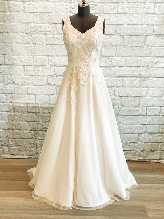 Full front of the Poppy gown with square-sweetheart neckline, tulle skirt,  and floral lace bodice