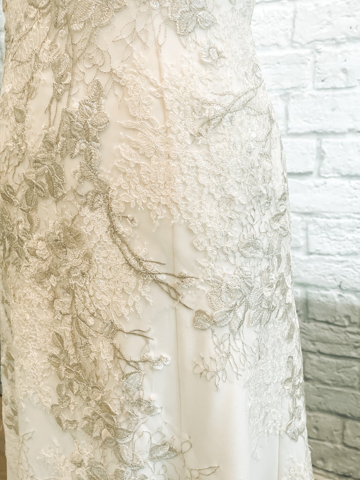 Up close lace detail showing off the cording and metallic threads.