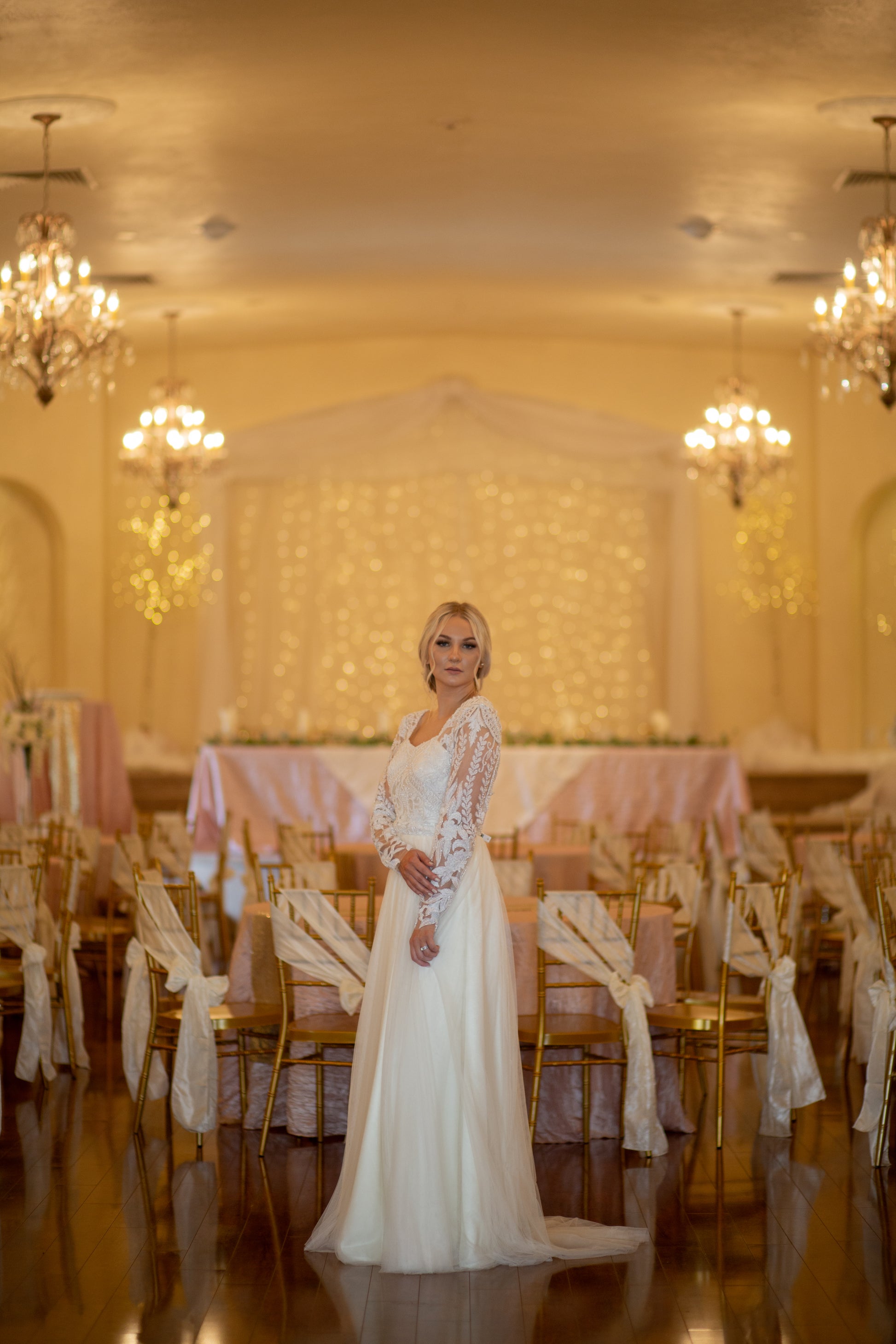 Bride turning in Farrah gown, skirt flowing for movement and softness.