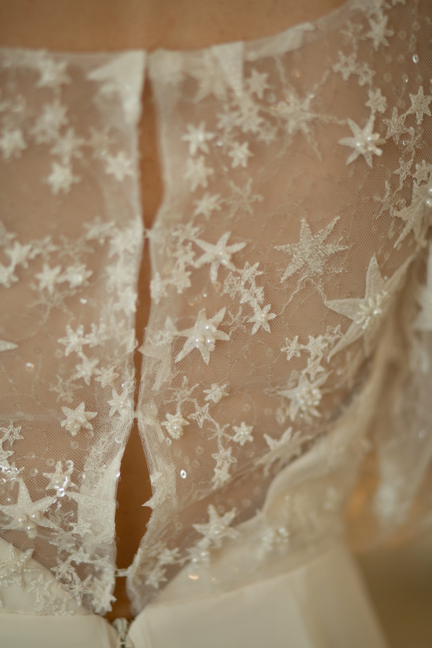Embroidered celestial lace on Novelli gown with sequin constellation accents