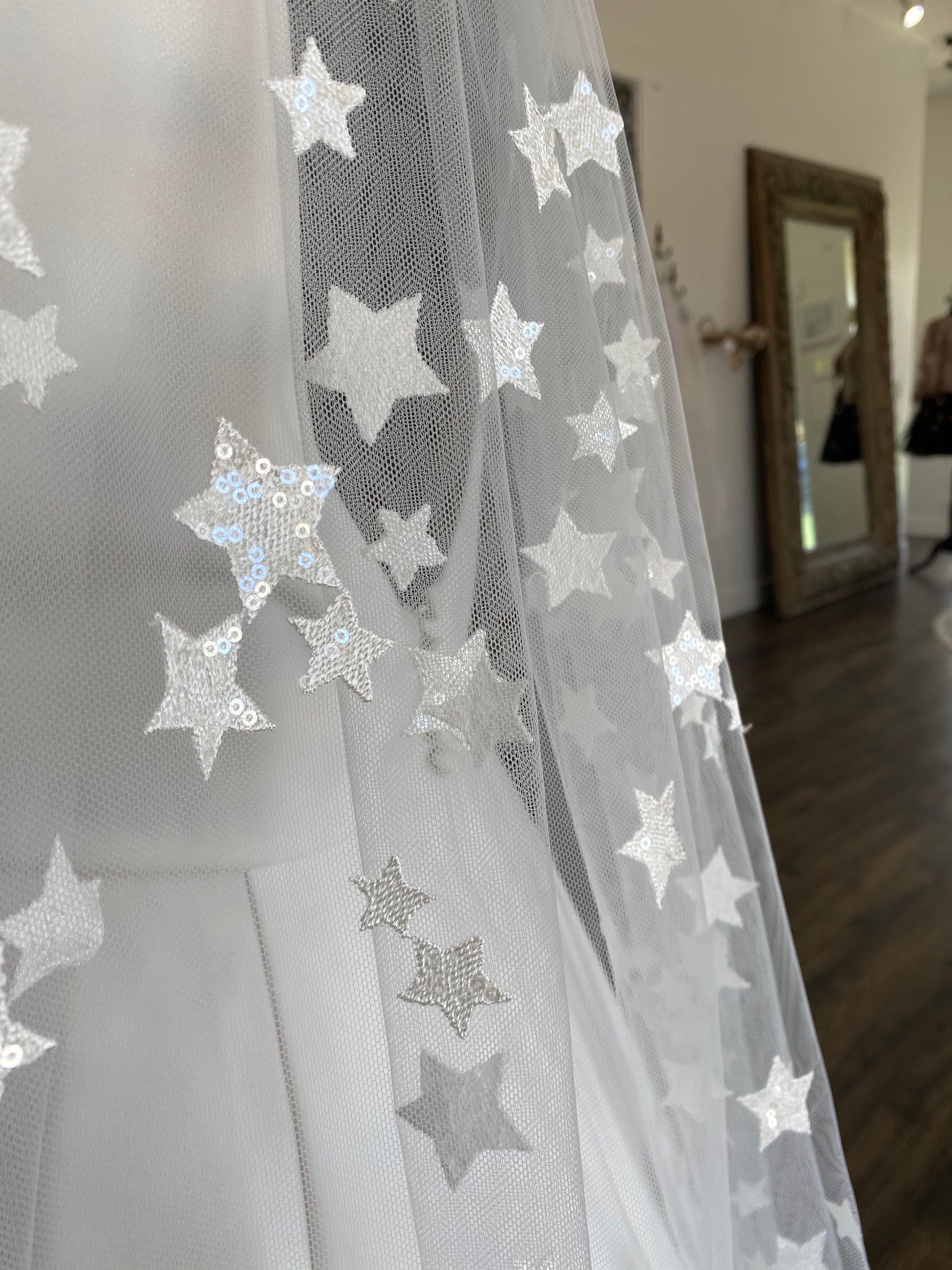 Delicate sequin stars sparkling on Nova veil, perfect for a celestial-themed wedding