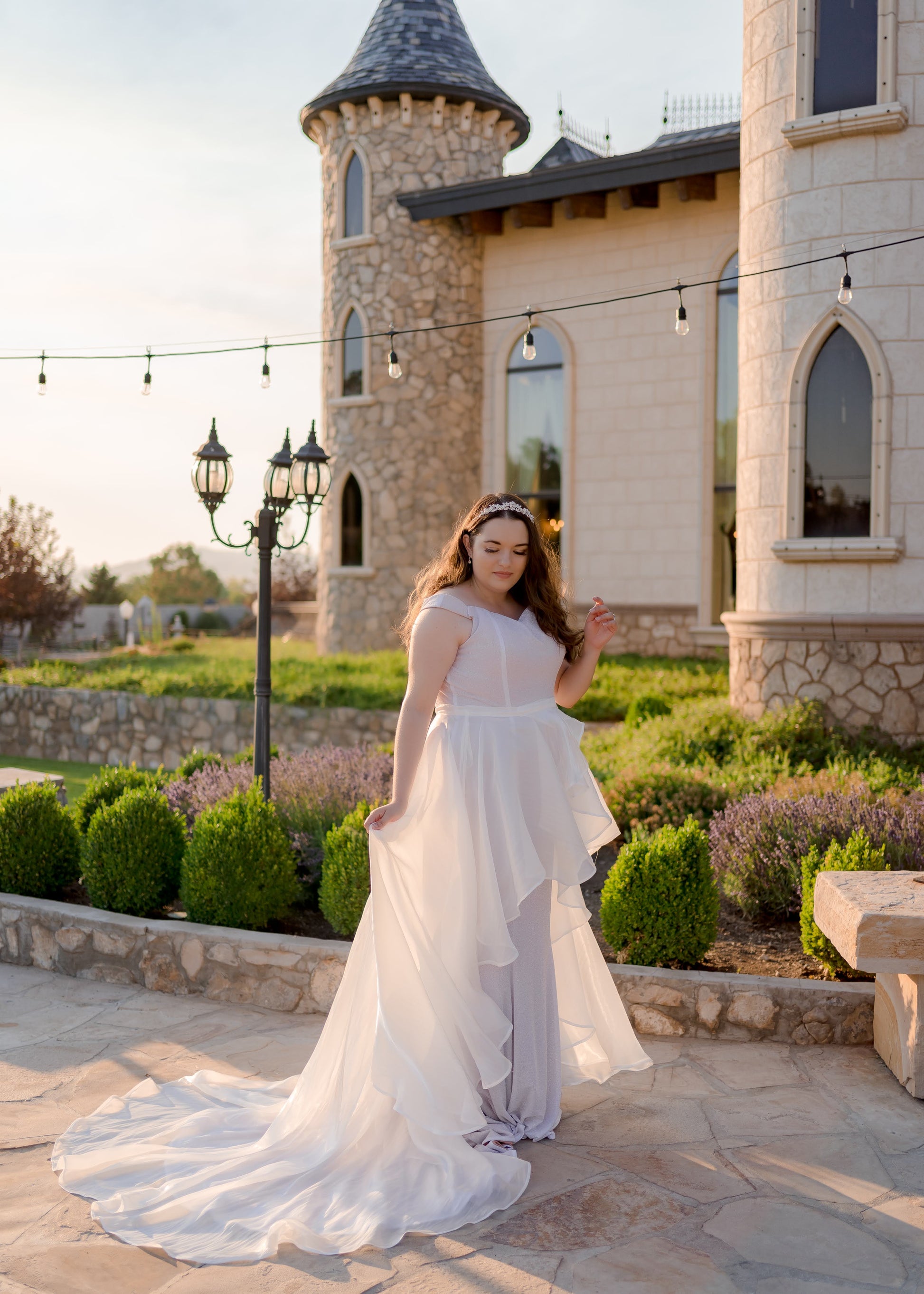 Perfectly possed image of a Bride wearing the Amber skirt spread out to the side showing off the train