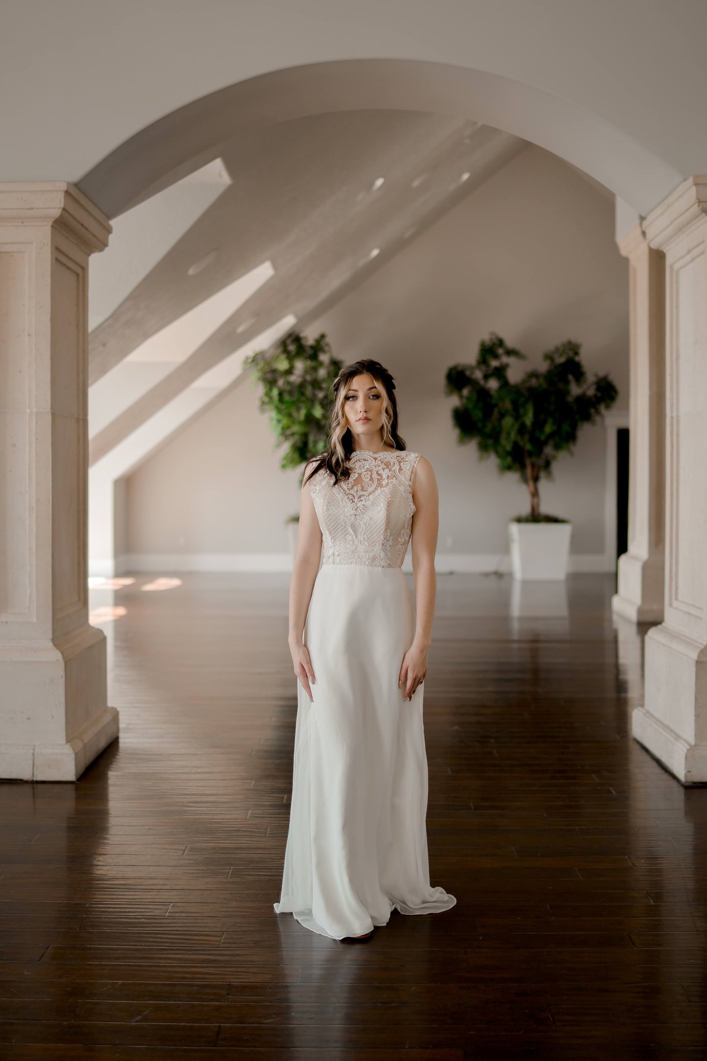 A full length shot of the Winifred gown on a walking bride; the flowing chiffon skirt without princess seams is really the focus here.