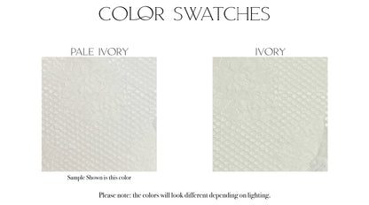 Fabric swatches of the two color options the Avabelle gown is offered in, Pale ivory and ivory.