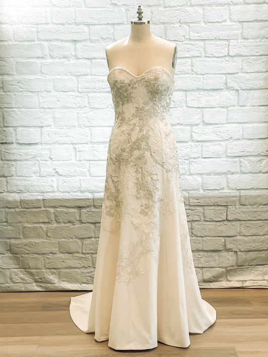 Full view of Giselle gown, strapless sweetheart neckline with fitted crepe silhouette.