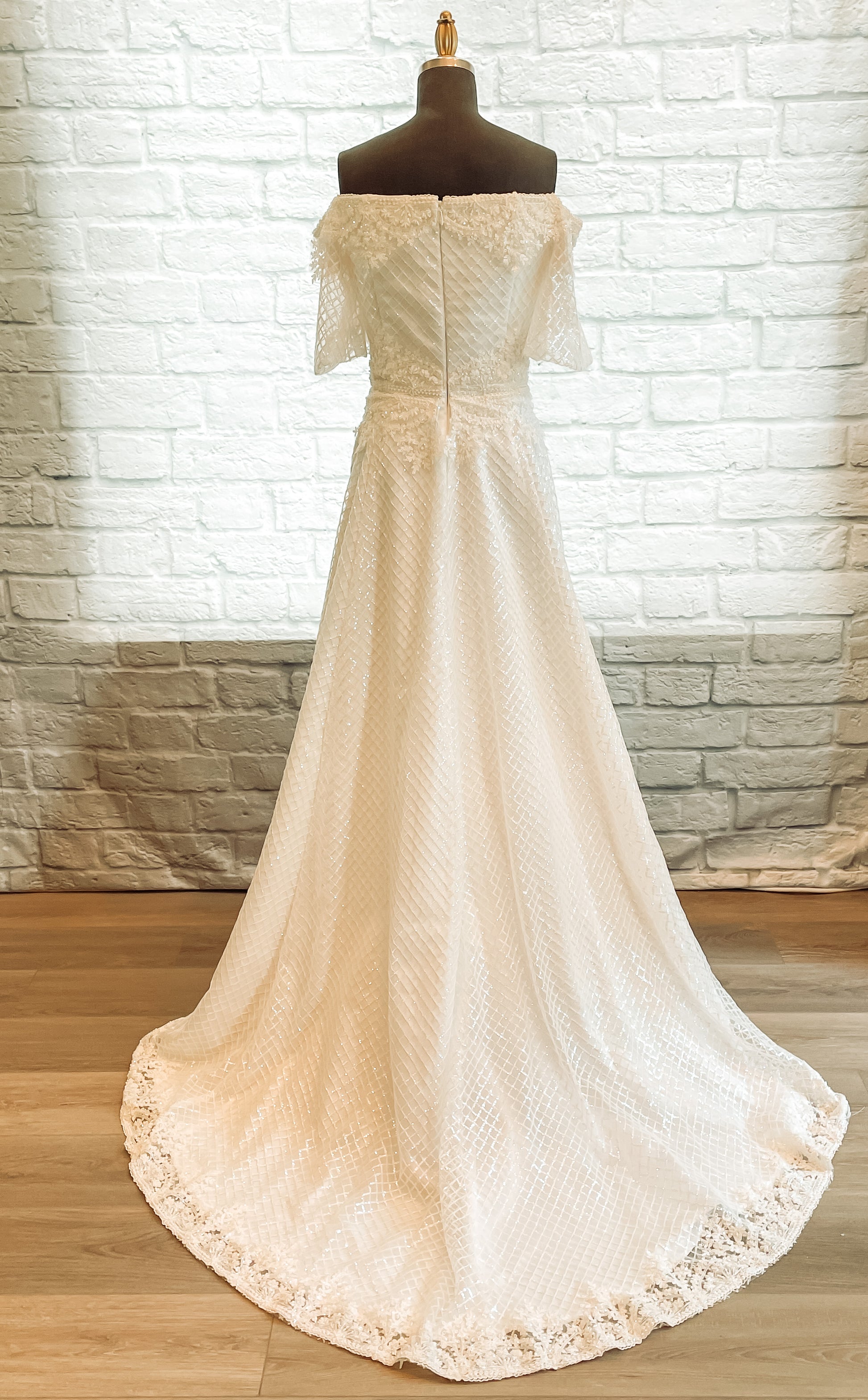 full back view of the parker gown with a Drape of beaded trim along back neckline with soft train. 