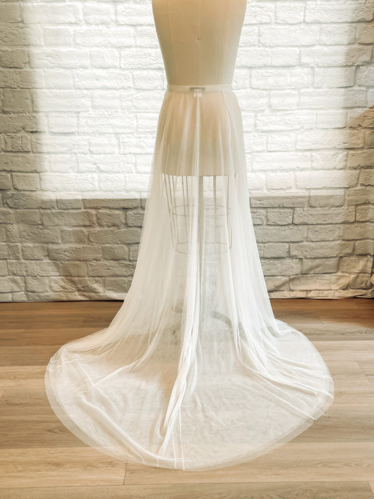 Back view of soft tulle Deon bridal skirt with 20-inch train displayed on a mannequin. 