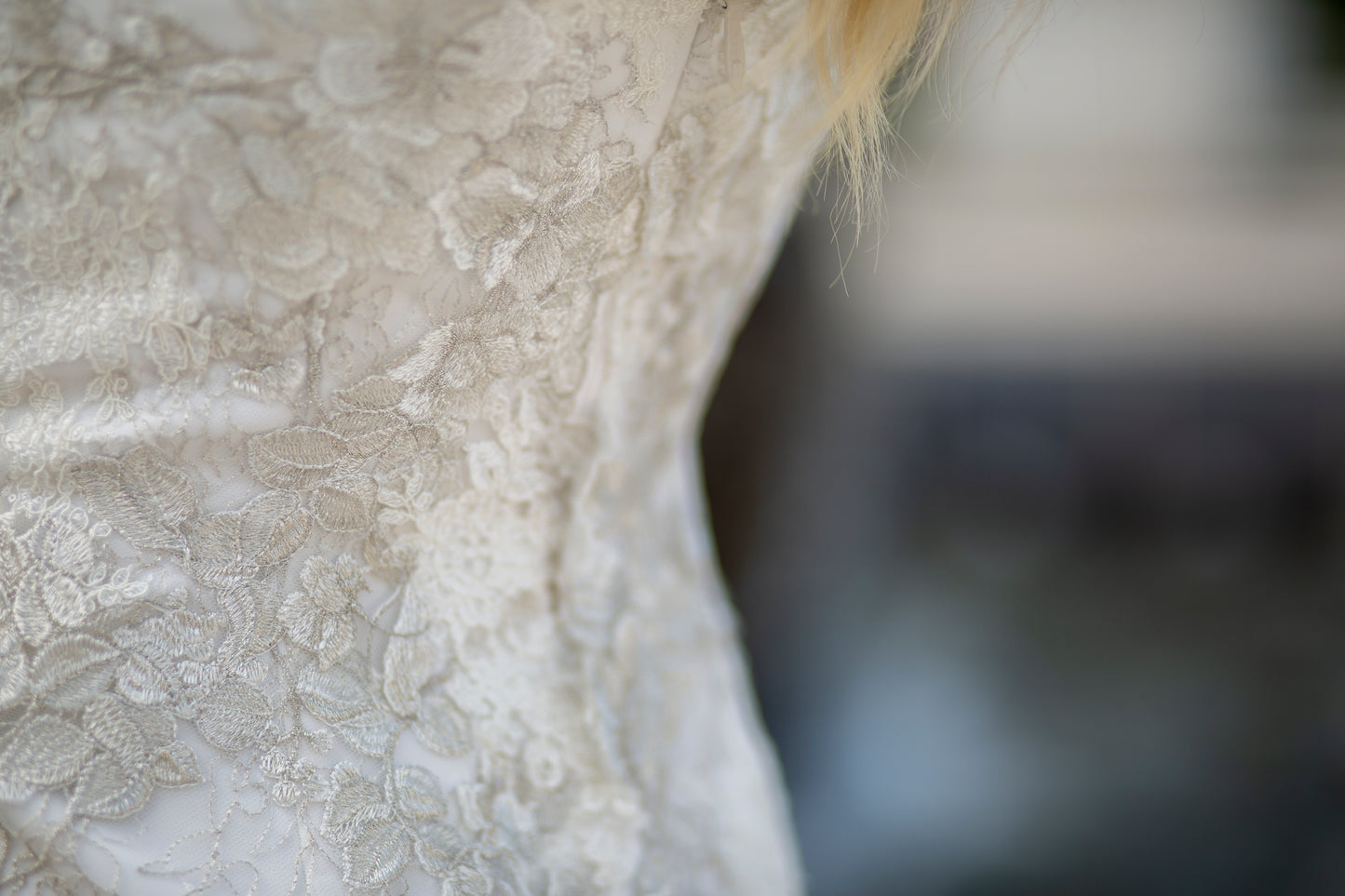 Macro image showing silver metallic thread within the lace.