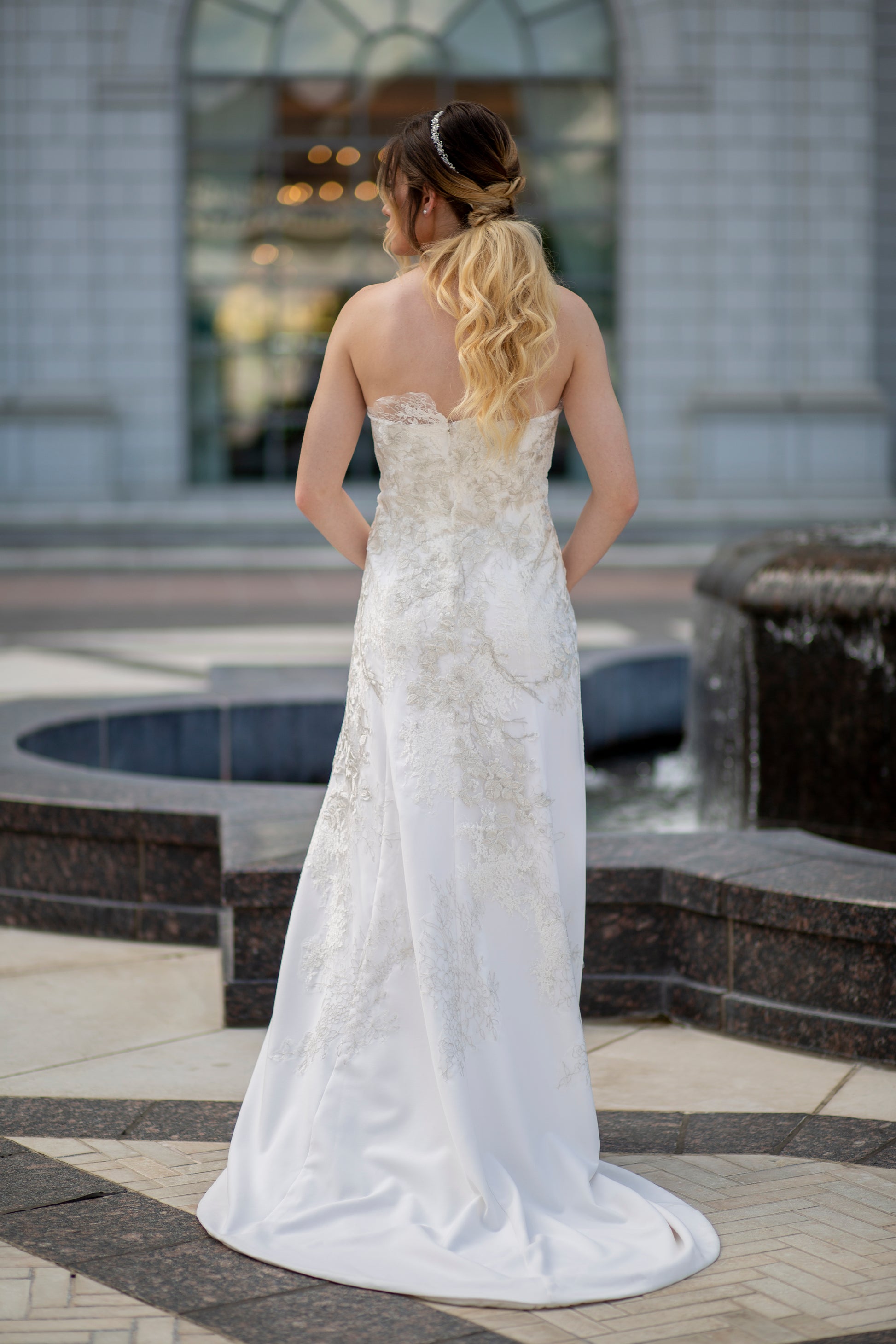 Back of Giselle gown showing smooth crepe flare and 18-inch train. 