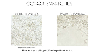 Fabric swatches of the two color options, ivory and White, for the Mia gown.