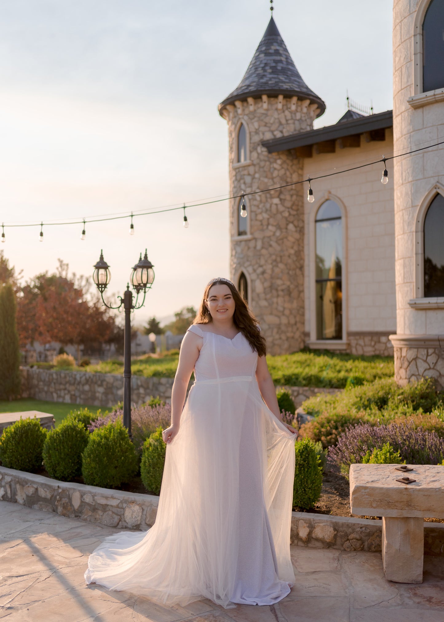 Full-length shot of deon skirt and Alora trumpet gown in natural light to highlight sparkle and fit