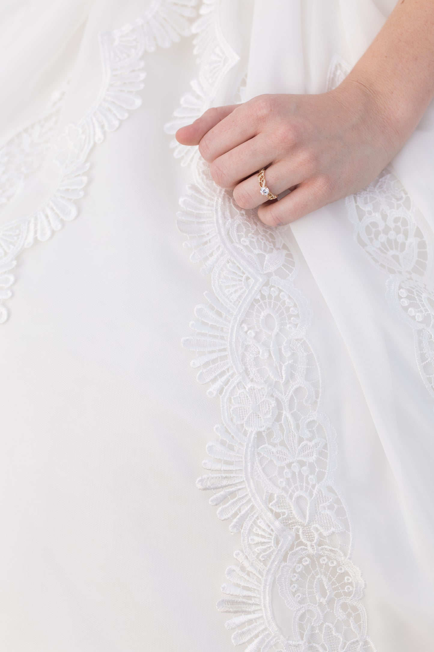 Romantic embroidered detail on Nerissa gown with soft chiffon and tulle texture